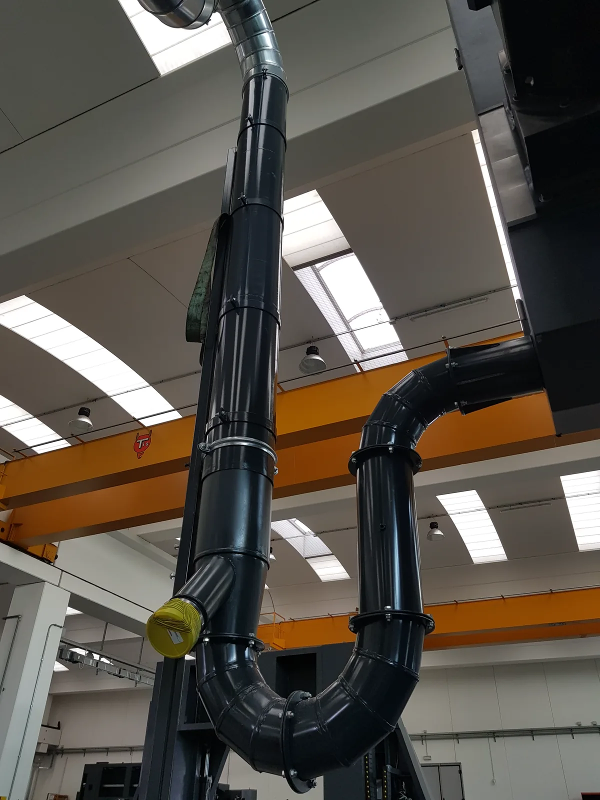 Réseau d'aspiration de copeaux installé en atelier industriel